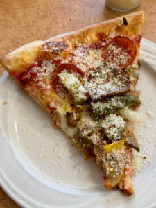 Large slice of Special pizza from Del Dio