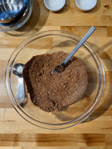 Pork rub in glass bowl with fork