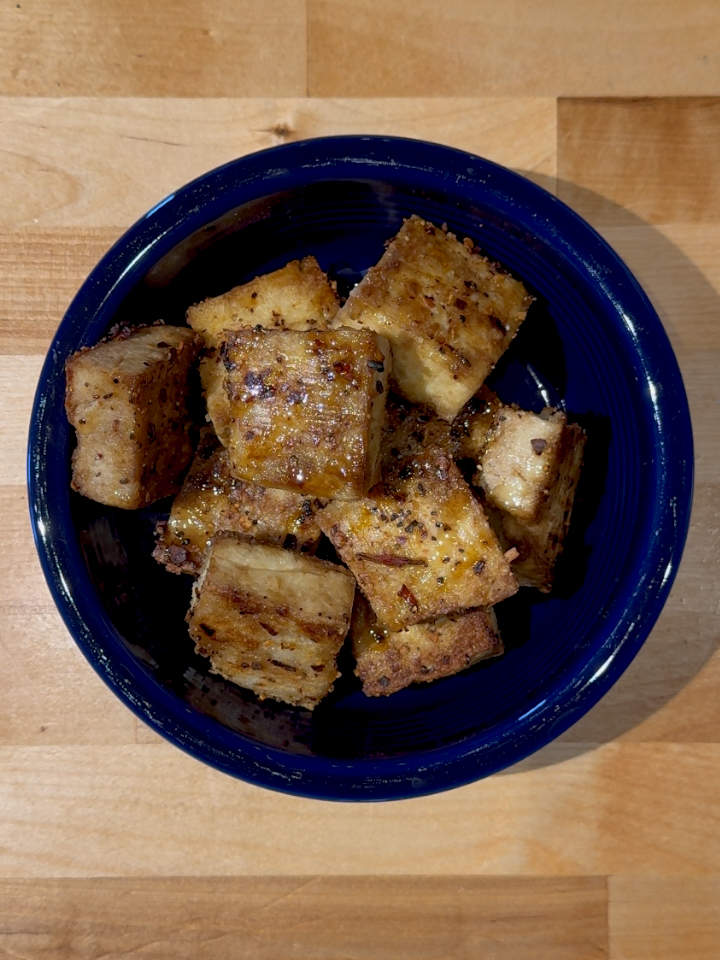 Baked Spicy Tofu in a blue bowl
