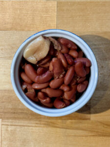 Chinese style red beans in a blue and white ramekin
